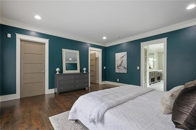 bedroom featuring ornamental molding, baseboards, ensuite bathroom, and wood finished floors