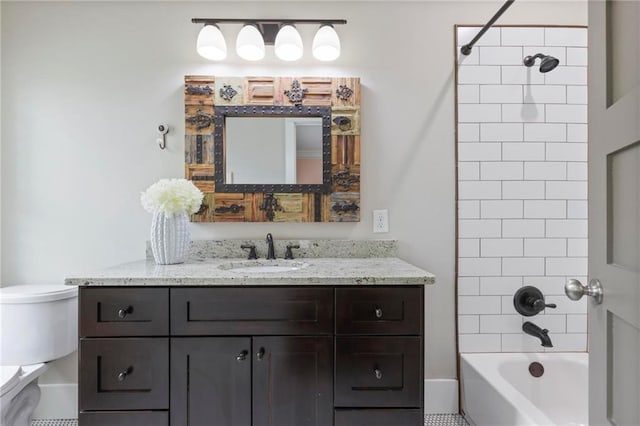 full bathroom featuring toilet, shower / bath combination, and vanity