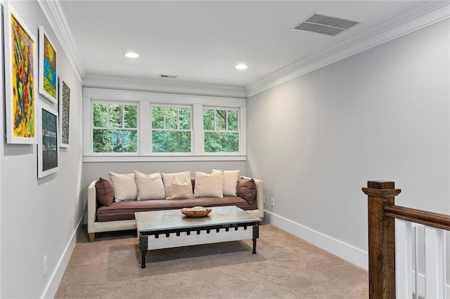 living room with carpet floors, visible vents, crown molding, and baseboards