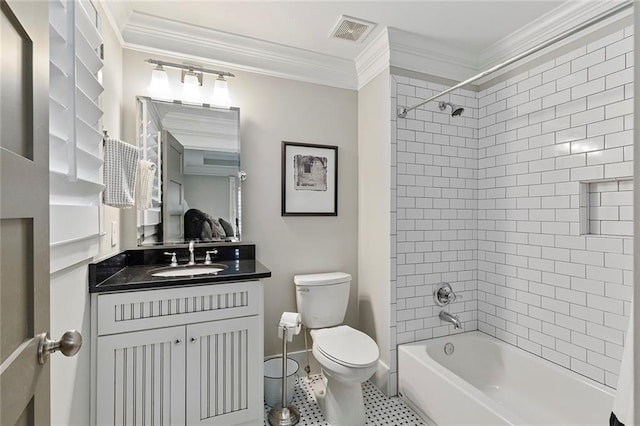 bathroom featuring visible vents, crown molding, vanity, and toilet