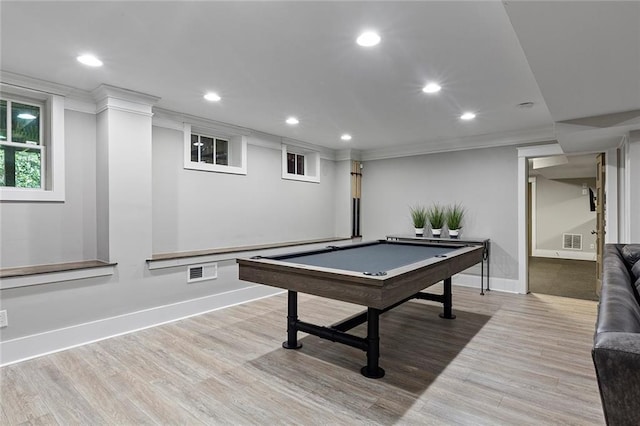 rec room with crown molding, recessed lighting, visible vents, wood finished floors, and baseboards