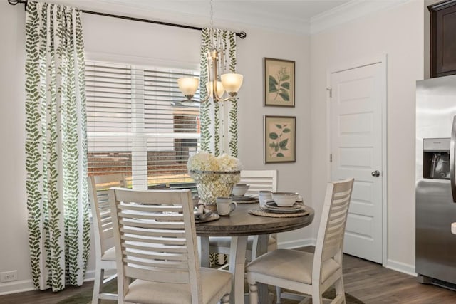 dining room featuring a chandelier, crown molding, baseboards, and dark wood-style floors