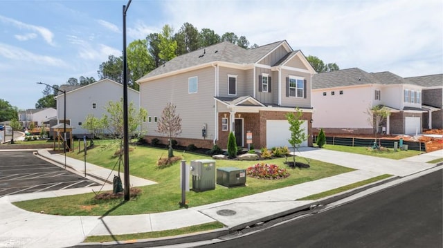 view of front of home featuring an attached garage, brick siding, a residential view, a front lawn, and board and batten siding