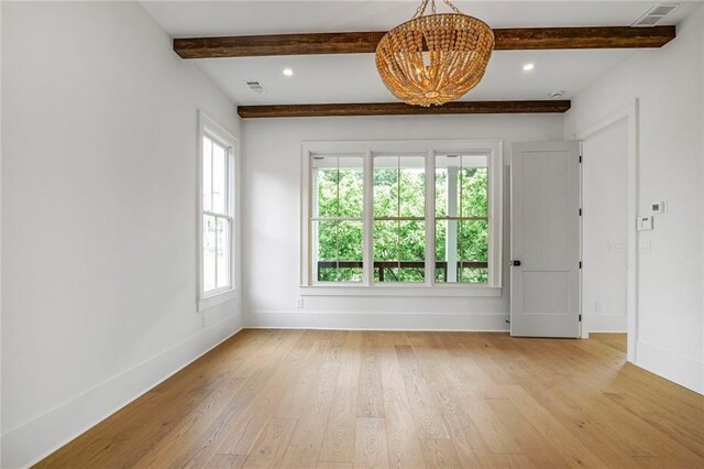 spare room featuring light wood-style floors, baseboards, a chandelier, beamed ceiling, and recessed lighting