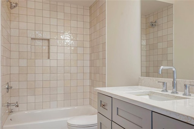 full bathroom with washtub / shower combination, toilet, and vanity