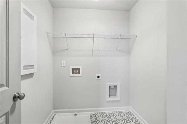 laundry room with hookup for a washing machine, laundry area, electric dryer hookup, and baseboards