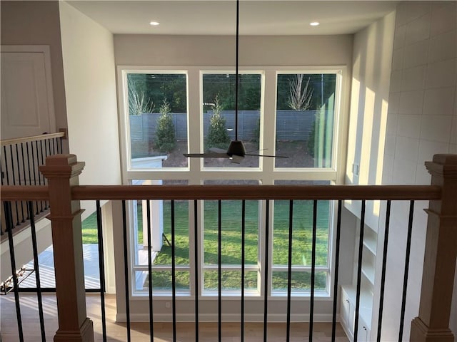 interior space with hardwood / wood-style flooring and ceiling fan