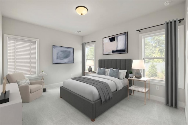 bedroom featuring light colored carpet