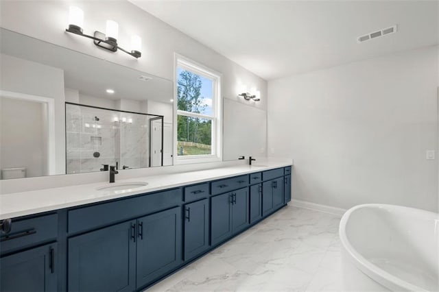 bathroom featuring vanity and separate shower and tub