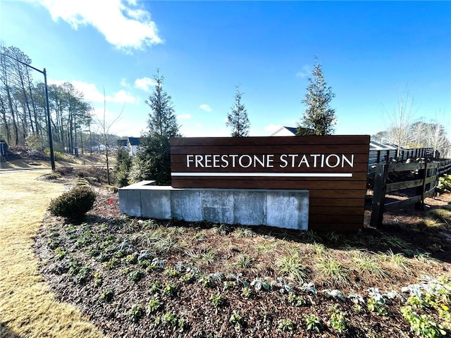 view of community sign