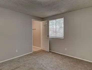 spare room with light carpet