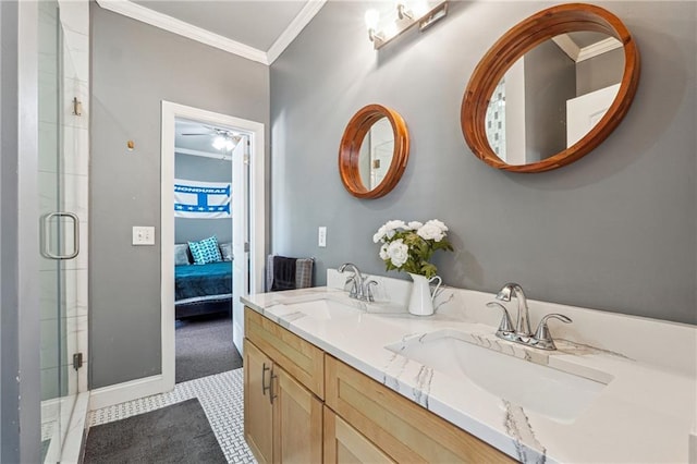 ensuite bathroom featuring crown molding, a shower with shower door, ensuite bathroom, and a sink