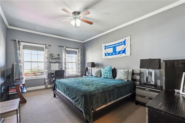 bedroom featuring baseboards, visible vents, ceiling fan, crown molding, and carpet flooring