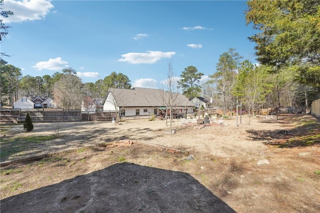 view of yard featuring fence