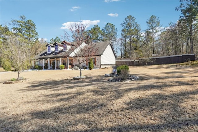 view of yard with fence