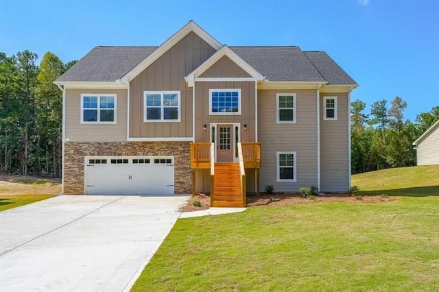 view of front facade with a front lawn and a garage