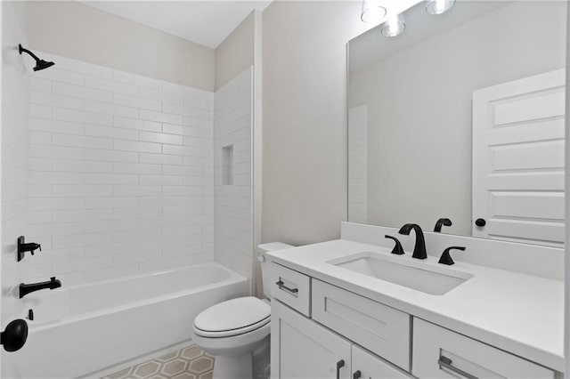 bathroom featuring shower / bathing tub combination, toilet, and vanity