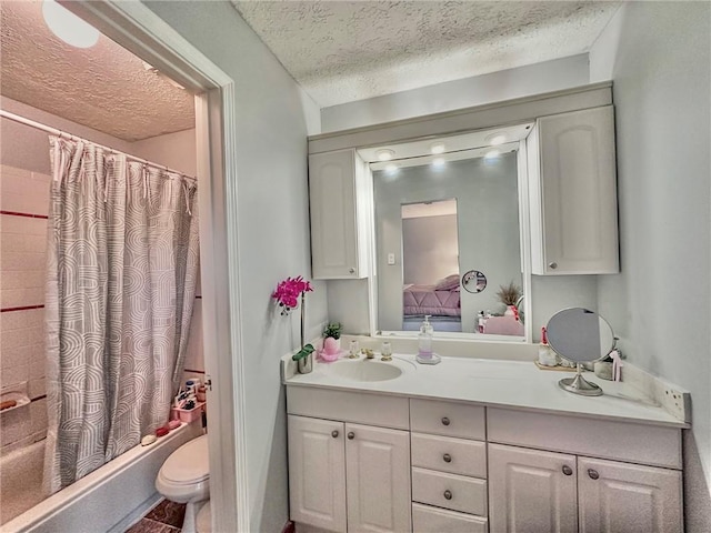 4359 Idlewood Ln, Tucker, GA 30084 - bathroom featuring a textured ceiling, toilet, vanity, and shower / bath combination with curtain