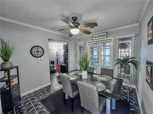 dining room featuring ceiling fan, french doors, and ornamental molding