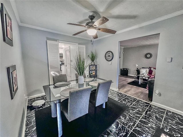 4359 Idlewood Ln, Tucker, GA 30084 - dining room with a ceiling fan, baseboards, marble finish floor, and crown molding