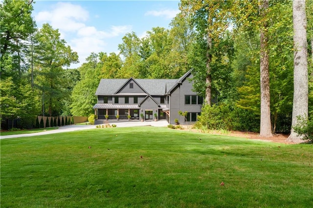 exterior space featuring a front yard