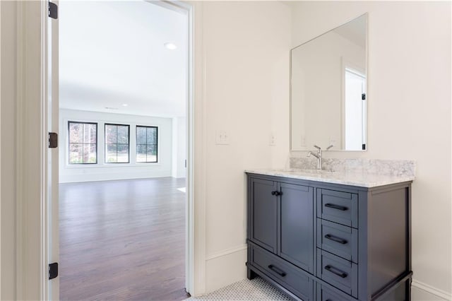 bathroom featuring hardwood / wood-style floors and vanity