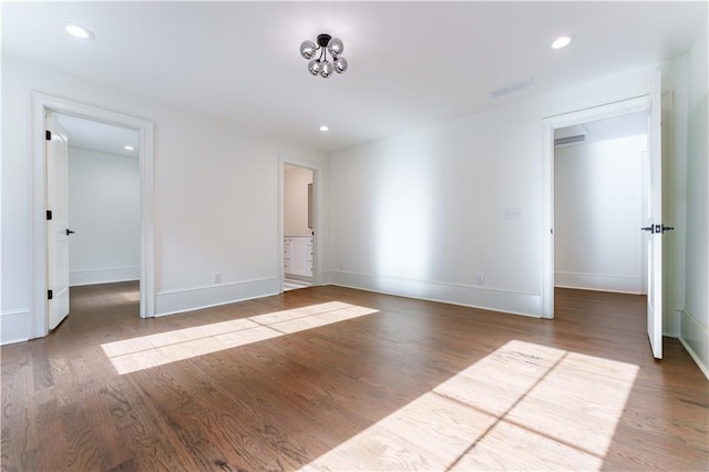 unfurnished room featuring hardwood / wood-style floors