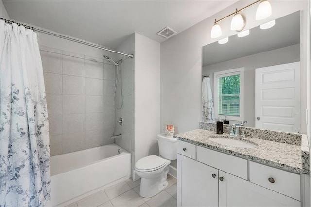 bathroom with shower / tub combo, toilet, visible vents, tile patterned flooring, and vanity