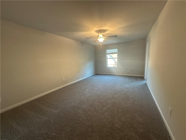 11045 Shadow Creek Ter, Hampton, GA 30228 - unfurnished room featuring a ceiling fan, dark colored carpet, and baseboards