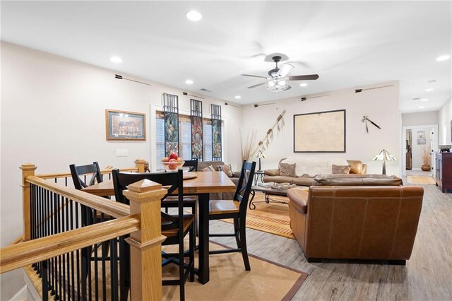 dining room with recessed lighting, light wood-style floors, and a ceiling fan