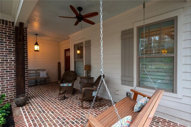 view of patio with covered porch and ceiling fan