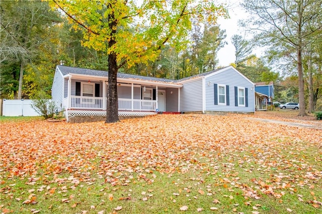 ranch-style house featuring a porch