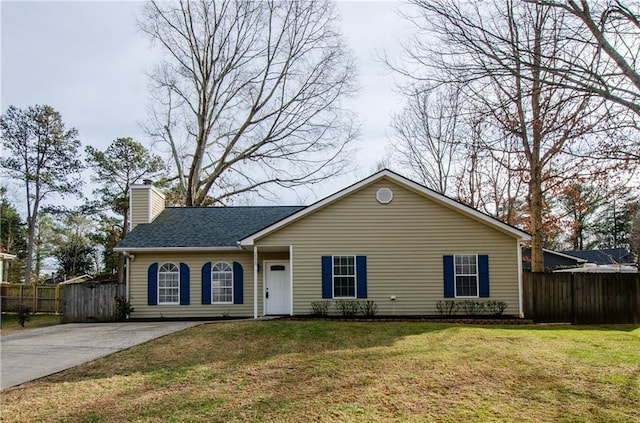 ranch-style home with a front lawn