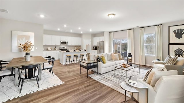 living room featuring light hardwood / wood-style flooring