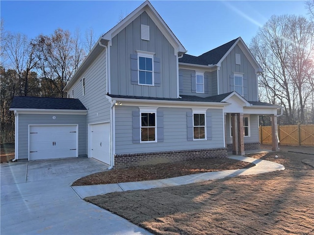 view of front of property featuring a garage