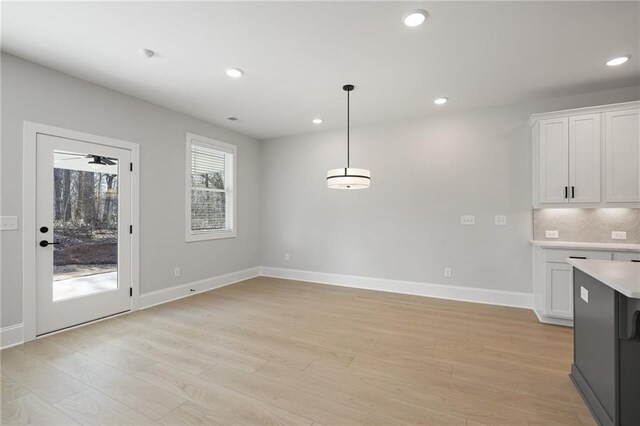 spare room featuring a wealth of natural light