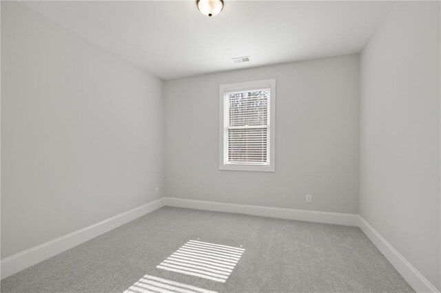 hallway with hardwood / wood-style floors