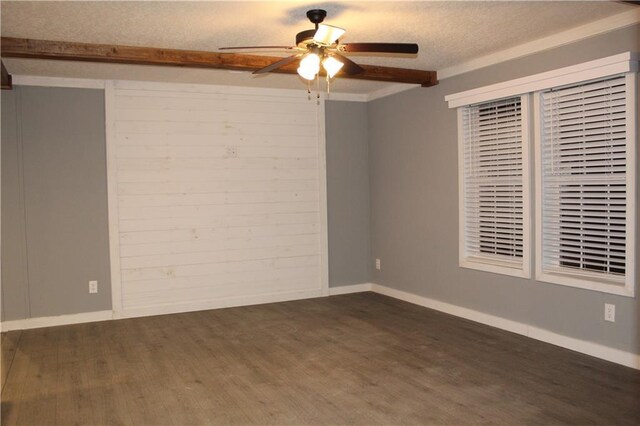 interior details featuring ceiling fan and beamed ceiling