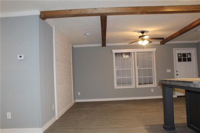 room details featuring wood counters, ornamental molding, a sink, white cabinetry, and backsplash