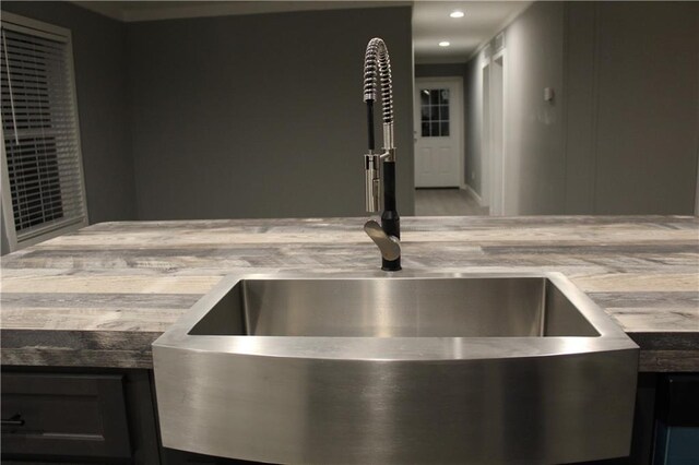 kitchen featuring light stone counters, white cabinets, and appliances with stainless steel finishes