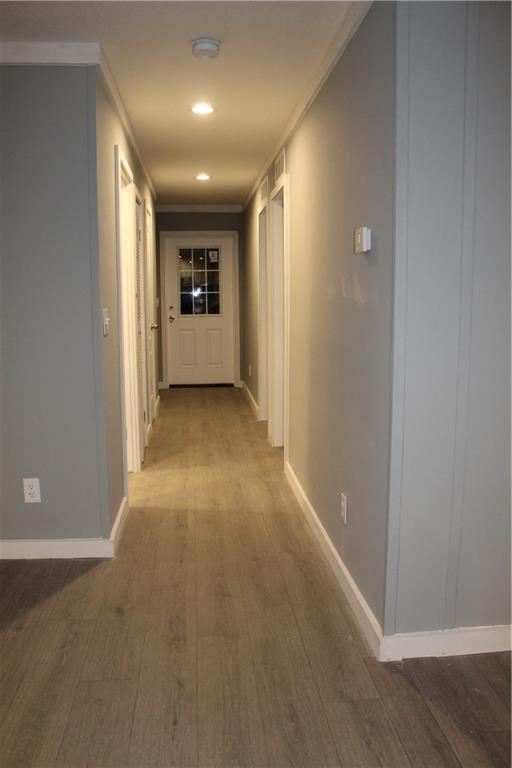 bathroom with vanity, hardwood / wood-style floors, and toilet