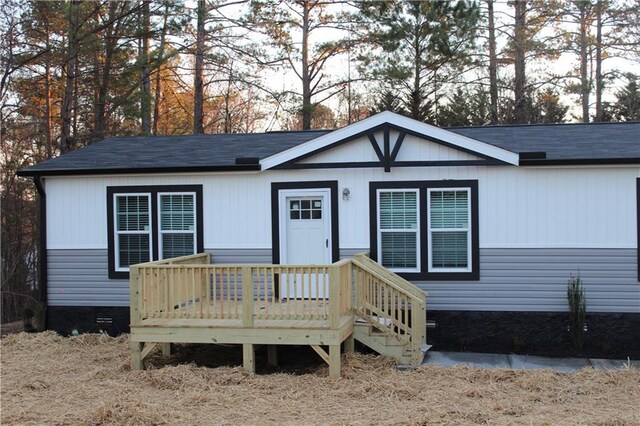 exterior space with a wooden deck