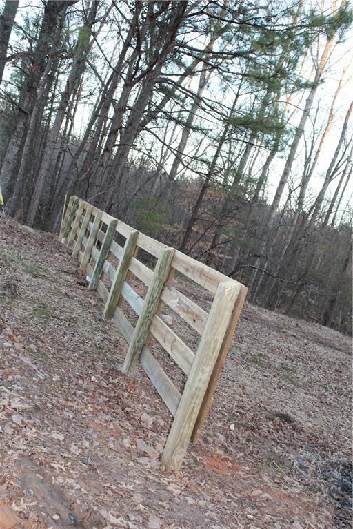 view of landscape featuring a wooded view