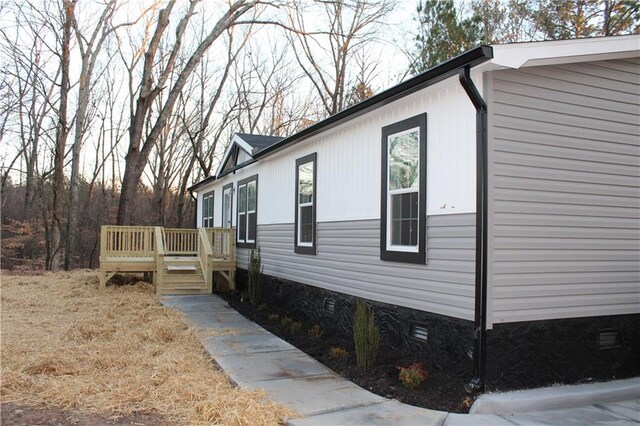 view of home's exterior featuring central AC