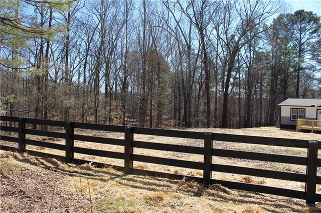 view of front of property featuring crawl space and a wooden deck