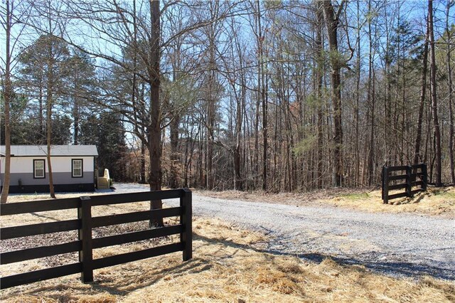 view of road with driveway