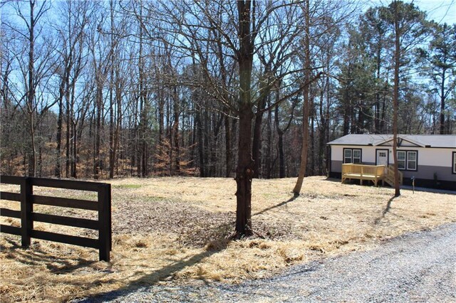 manufactured / mobile home with crawl space and a wooden deck