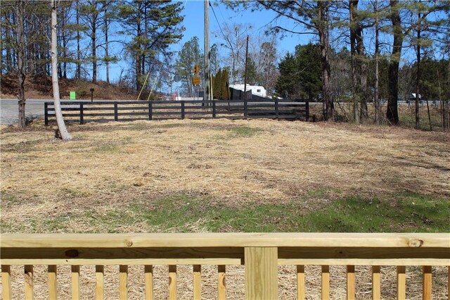 view of home's exterior featuring a wooden deck