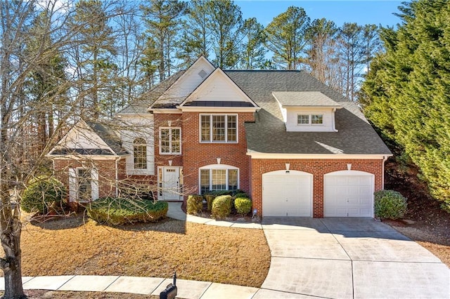 front of property with a garage