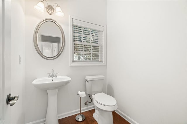 bathroom featuring sink and toilet